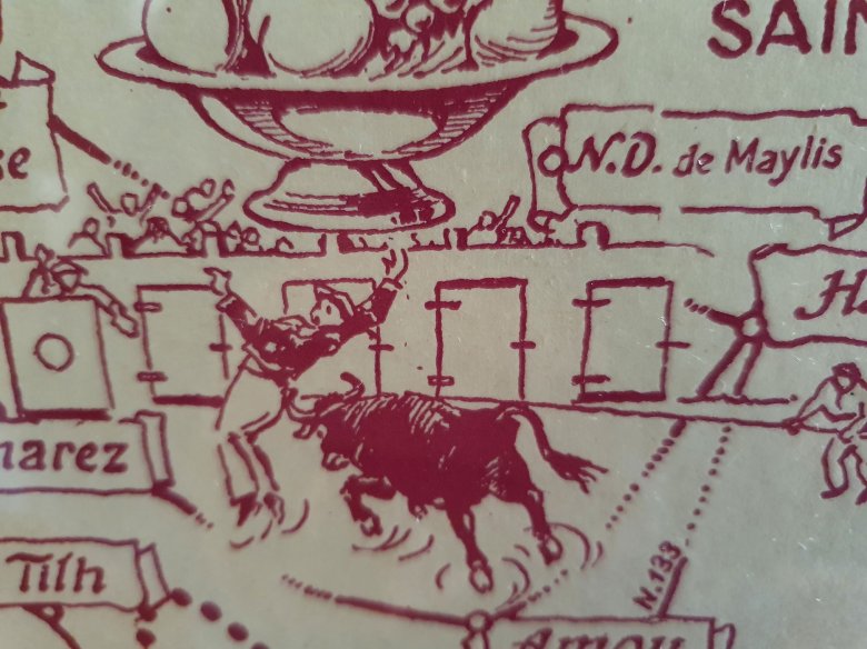 Aficha suu torisme landés, dab la representacion de l'emblematica corsa de vacas dens ua arèna rurau, deu costat de Shalòssa