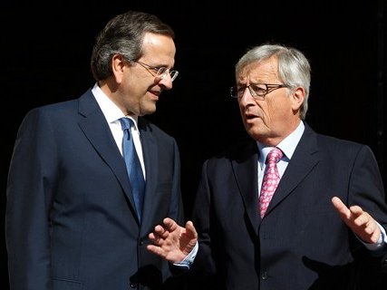 Antonis Samaras, primièr ministre sortent (a esquèrra), amb Jean-Claude Juncker, president de la Comission Europèa (a drecha) 