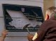 De manifestants croats an destruch de pancartas en cirillic a Vukovar